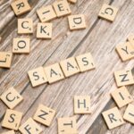 scrabble-letters-spelling-saas-on-a-wooden-tabl